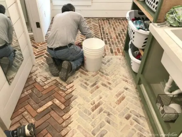 laying a brick floor