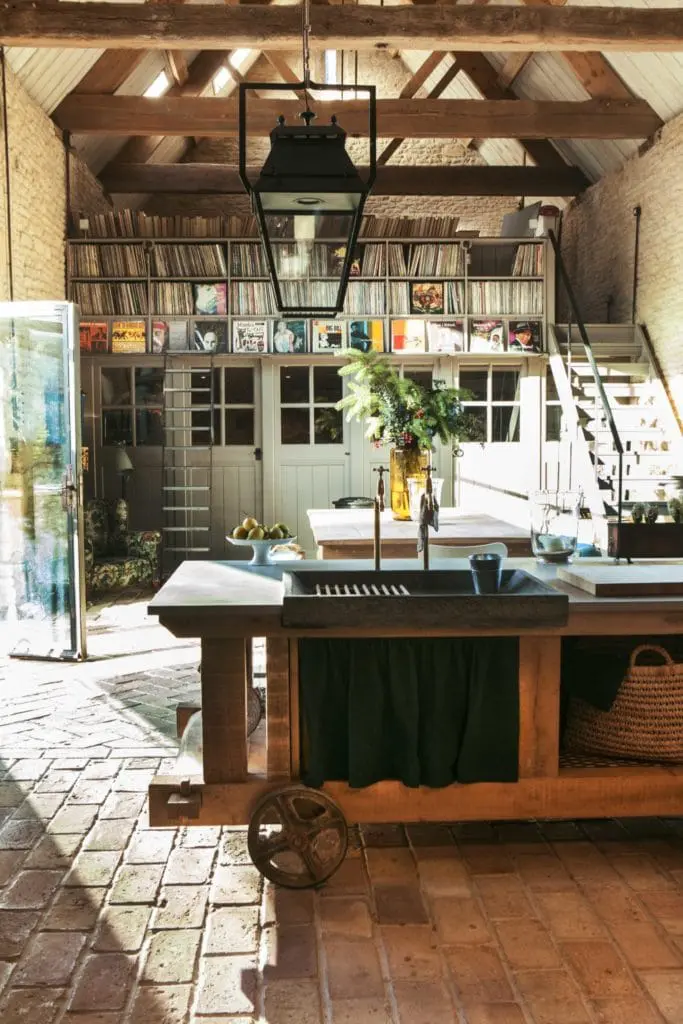 rustic brick floor with kitchen