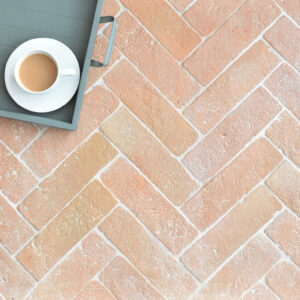 terracotta brick tiles in herringbone